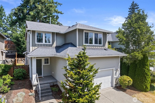 21552 SE 275th Ct, Maple Valley, WA 98038 - view of front of home with an attached garage, board and batten siding, and driveway