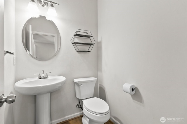 21552 SE 275th Ct, Maple Valley, WA 98038 - bathroom with toilet and wood finished floors