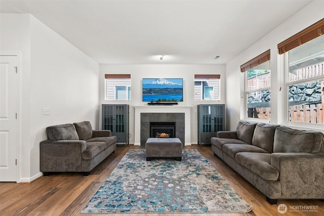 21552 SE 275th Ct, Maple Valley, WA 98038 - living area with wood finished floors and a fireplace