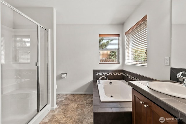 21552 SE 275th Ct, Maple Valley, WA 98038 - bathroom featuring vanity, a garden tub, and a shower stall