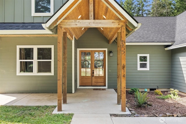 809 NW Gertrude Ave, Winlock, WA 98596 - doorway to property featuring a shingled roof, board and batten siding, and french doors