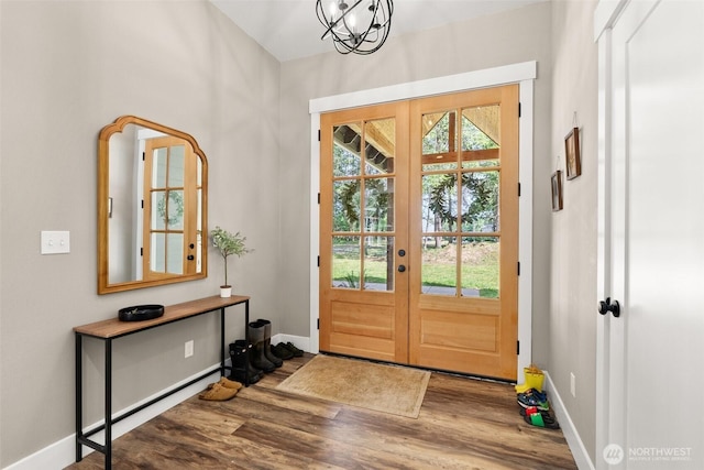 809 NW Gertrude Ave, Winlock, WA 98596 - foyer entrance featuring french doors, wood finished floors, healthy amount of natural light, and a chandelier