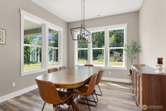 809 NW Gertrude Ave, Winlock, WA 98596 - dining area with healthy amount of natural light and wood finished floors
