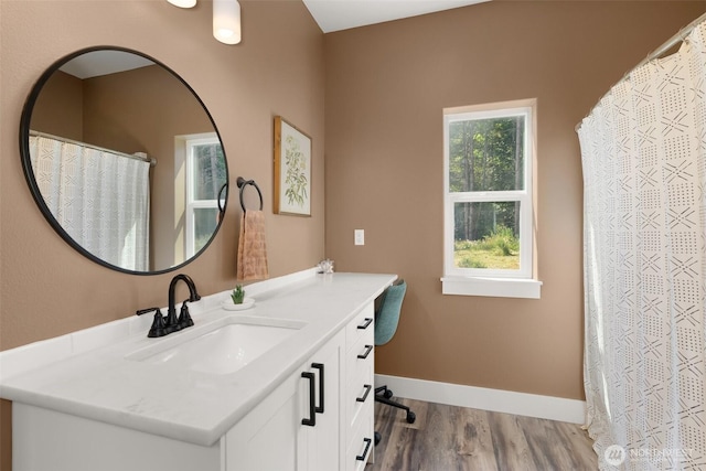 809 NW Gertrude Ave, Winlock, WA 98596 - bathroom featuring wood finished floors and vanity