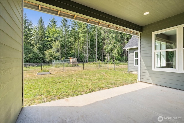809 NW Gertrude Ave, Winlock, WA 98596 - fenced backyard featuring a patio area and a wooded view