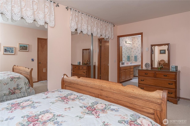160 Wildwood Shrs, Brinnon, WA 98320 - bedroom with light colored carpet, a closet, and ensuite bathroom