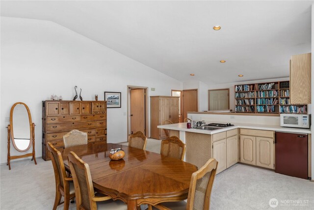 160 Wildwood Shrs, Brinnon, WA 98320 - dining space with vaulted ceiling, light carpet, and recessed lighting