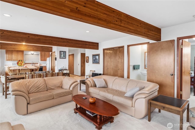 160 Wildwood Shrs, Brinnon, WA 98320 - living area with beam ceiling, recessed lighting, and light colored carpet