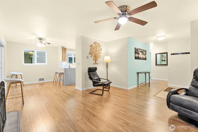4617 Grandview Dr W Unit D, Tacoma, WA 98466 - sitting room featuring ceiling fan and light wood-style flooring