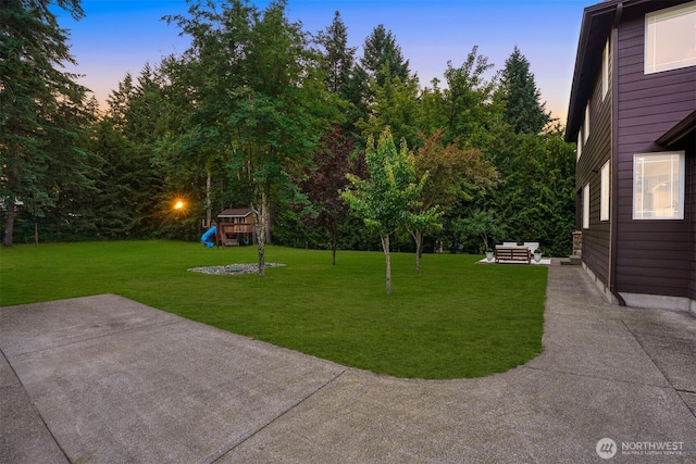 24702 64th Ave E, Graham, WA 98338 - view of green lawn with a playground and a patio area