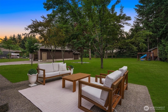 24702 64th Ave E, Graham, WA 98338 - view of patio / terrace with an outdoor living space and an outbuilding