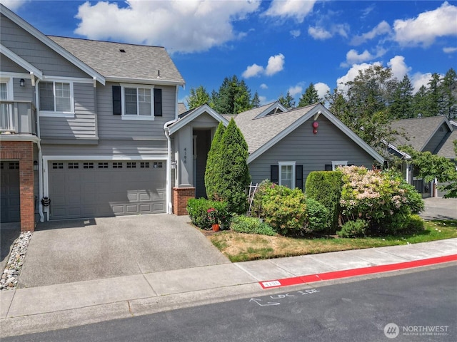 4196 248th Ct SE Unit 62, Sammamish, WA 98029 - view of front of property featuring an attached garage, a shingled roof, asphalt driveway, and brick siding