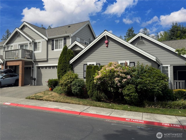 4196 248th Ct SE Unit 62, Sammamish, WA 98029 - view of front facade featuring an attached garage and asphalt driveway