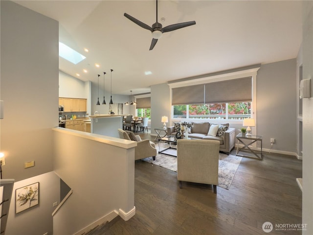 4196 248th Ct SE Unit 62, Sammamish, WA 98029 - living room with plenty of natural light, dark wood-type flooring, lofted ceiling, ceiling fan, and a skylight