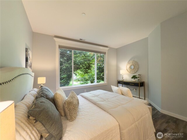 4196 248th Ct SE Unit 62, Sammamish, WA 98029 - bedroom with dark wood-style flooring and baseboards