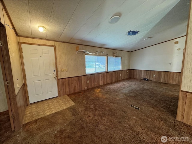 31600 126th Ave SE Unit 100, Auburn, WA 98092 - entrance foyer with wood walls, a wainscoted wall, and carpet floors