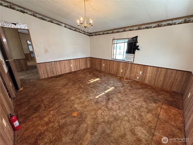 31600 126th Ave SE Unit 100, Auburn, WA 98092 - empty room with a wainscoted wall, a chandelier, wood walls, carpet, and cooling unit