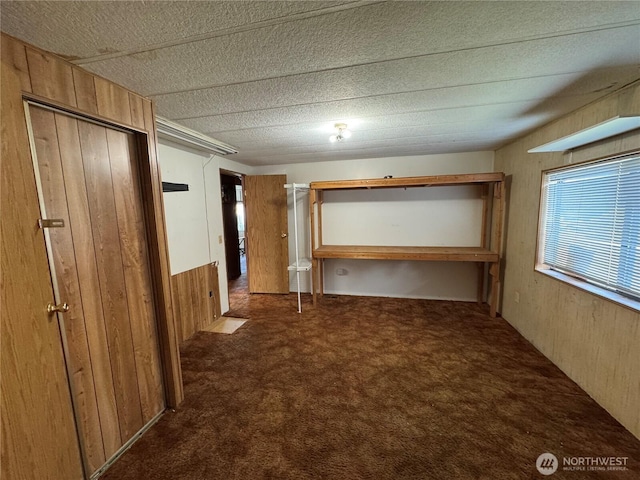 31600 126th Ave SE Unit 100, Auburn, WA 98092 - unfurnished bedroom featuring carpet flooring and wooden walls