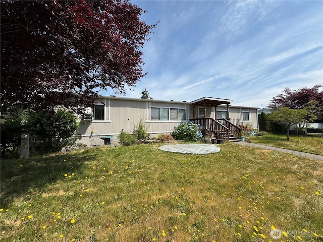 31600 126th Ave SE Unit 100, Auburn, WA 98092 - manufactured / mobile home with a front lawn