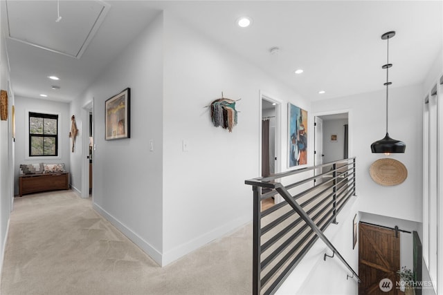 485 Hidden Ln, Chelan, WA 98816 - corridor with attic access, an upstairs landing, light carpet, and recessed lighting