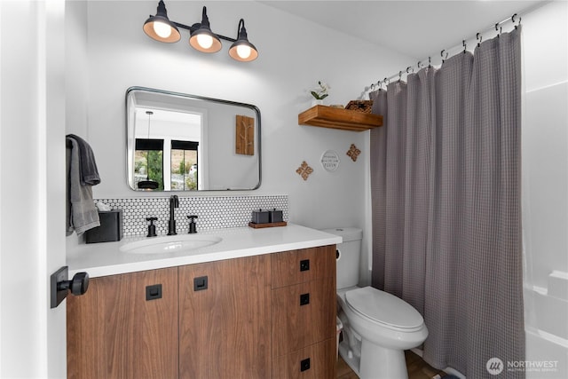 485 Hidden Ln, Chelan, WA 98816 - full bathroom featuring vanity, backsplash, and shower / bath combo with shower curtain