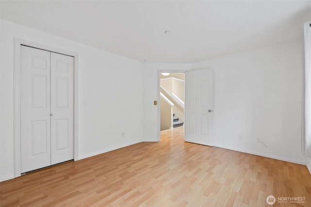 4714 Fairwood Blvd NE Unit 1704, Tacoma, WA 98422 - spare room with light wood finished floors and stairway