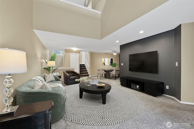 4714 Fairwood Blvd NE Unit 1704, Tacoma, WA 98422 - living room featuring carpet flooring, stairs, a ceiling fan, recessed lighting, and a high ceiling