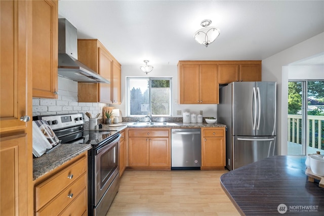 33513 35th Ave SW, Federal Way, WA 98023 - kitchen with stainless steel appliances, wall chimney exhaust hood, light wood-style floors, backsplash, and dark stone countertops