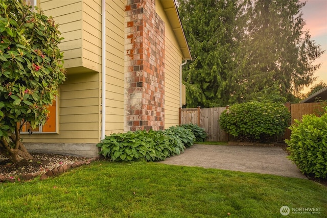 33513 35th Ave SW, Federal Way, WA 98023 - view of side of property featuring brick siding and a patio area