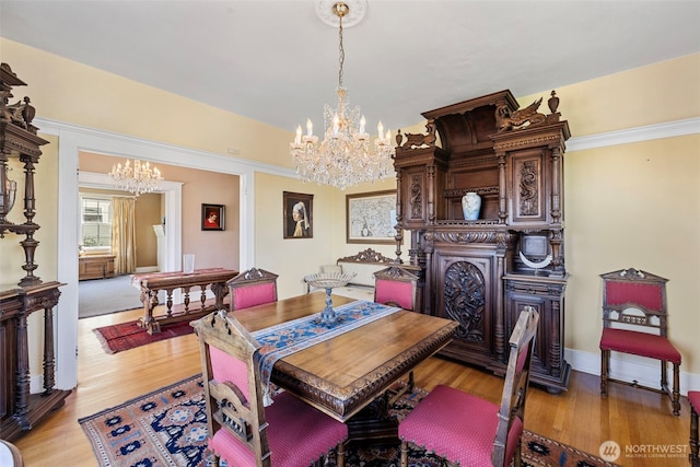 4410 N 45th St, Tacoma, WA 98407 - dining room featuring a chandelier and light wood-style flooring
