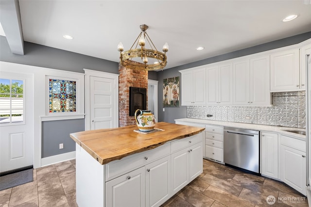 4410 N 45th St, Tacoma, WA 98407 - kitchen featuring dishwasher, butcher block counters, backsplash, white cabinetry, and recessed lighting