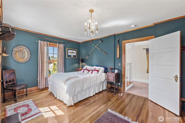 4410 N 45th St, Tacoma, WA 98407 - bedroom with wood finished floors, a chandelier, and crown molding