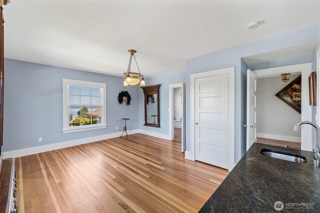 4410 N 45th St, Tacoma, WA 98407 - unfurnished dining area with light wood-style floors