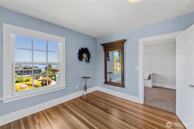 4410 N 45th St, Tacoma, WA 98407 - spare room with wood finished floors and baseboards