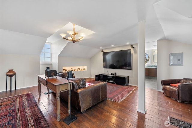 4410 N 45th St, Tacoma, WA 98407 - living area featuring vaulted ceiling, electric panel, dark wood finished floors, and a chandelier