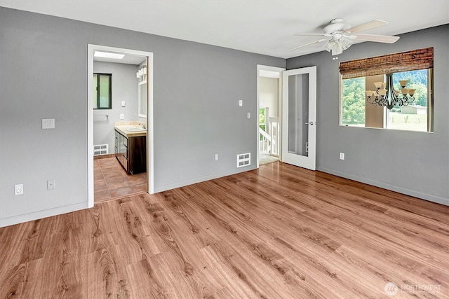 25321 133rd Ave NE, Arlington, WA 98223 - unfurnished room with a ceiling fan and light wood-style floors