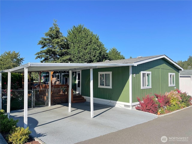15410 SE 272nd St Unit 71, Kent, WA 98030 - view of front of home featuring a carport