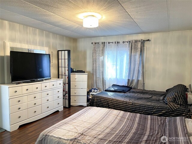 15410 SE 272nd St Unit 71, Kent, WA 98030 - bedroom with dark wood-style flooring