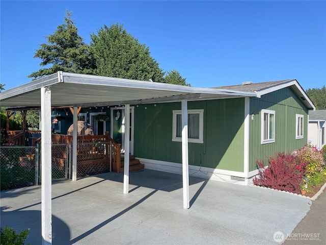 15410 SE 272nd St Unit 71, Kent, WA 98030 - view of patio / terrace with a carport