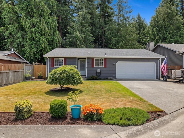 7102 Church Creek Cir NW, Stanwood, WA 98292 - view of front of house featuring an attached garage and concrete driveway