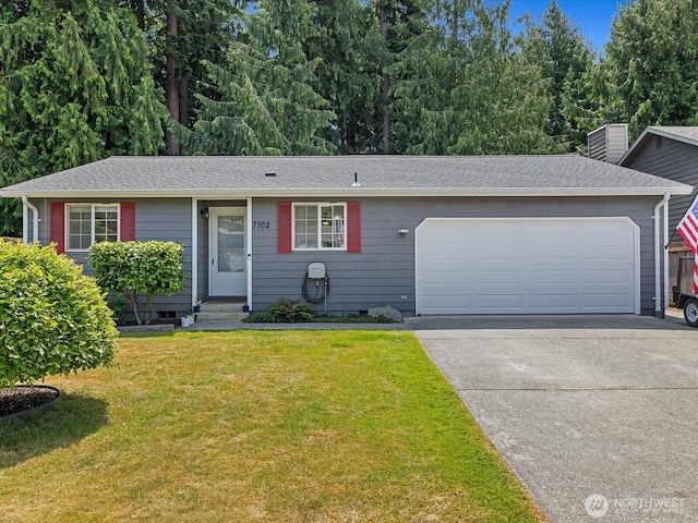 7102 Church Creek Cir NW, Stanwood, WA 98292 - single story home featuring concrete driveway, a garage, a front lawn, and a shingled roof