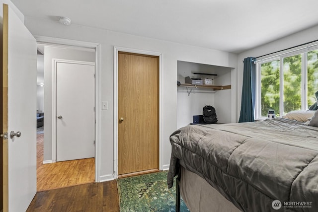 1717 14th Ave SE, Olympia, WA 98501 - bedroom featuring wood finished floors and baseboards