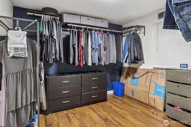1717 14th Ave SE, Olympia, WA 98501 - walk in closet featuring wood finished floors