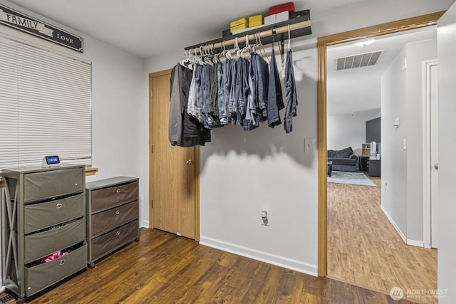 1717 14th Ave SE, Olympia, WA 98501 - spacious closet with dark wood-style flooring