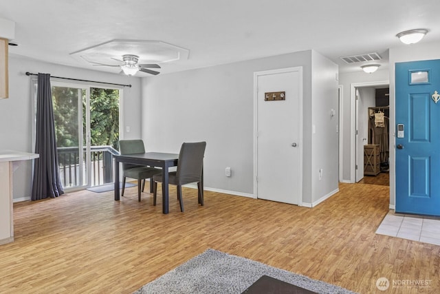 1717 14th Ave SE, Olympia, WA 98501 - dining room with light wood-style flooring and a ceiling fan