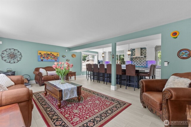 6830 SE Arlington Pl, Port Orchard, WA 98367 - living area featuring healthy amount of natural light