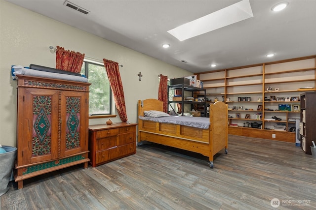 6830 SE Arlington Pl, Port Orchard, WA 98367 - bedroom featuring wood finished floors, a skylight, and recessed lighting