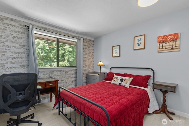6830 SE Arlington Pl, Port Orchard, WA 98367 - bedroom featuring an accent wall and an office area
