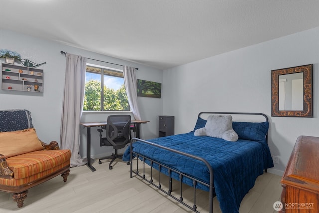 6830 SE Arlington Pl, Port Orchard, WA 98367 - bedroom with wood finished floors