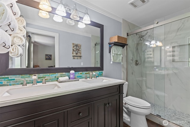 6830 SE Arlington Pl, Port Orchard, WA 98367 - full bathroom with double vanity, a marble finish shower, backsplash, and ornamental molding